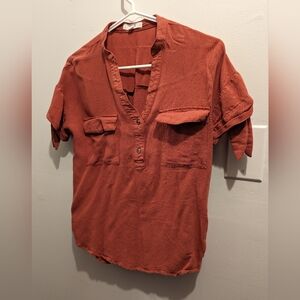 Small, burnt orange shirt